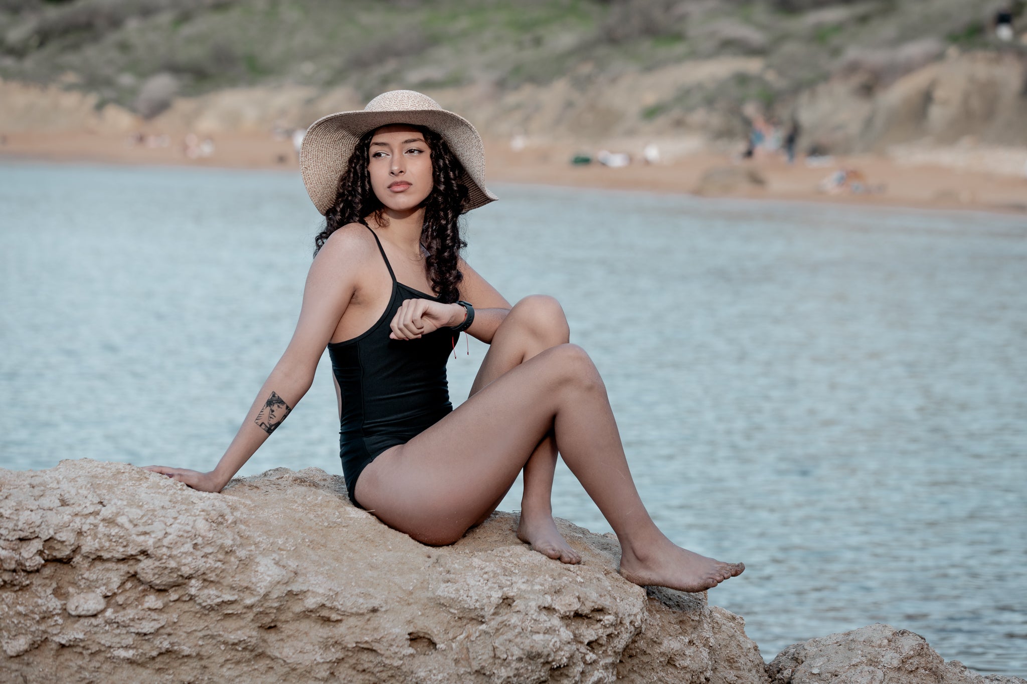 Lore & Leaf Malta period swimsuit one piece beach sitting