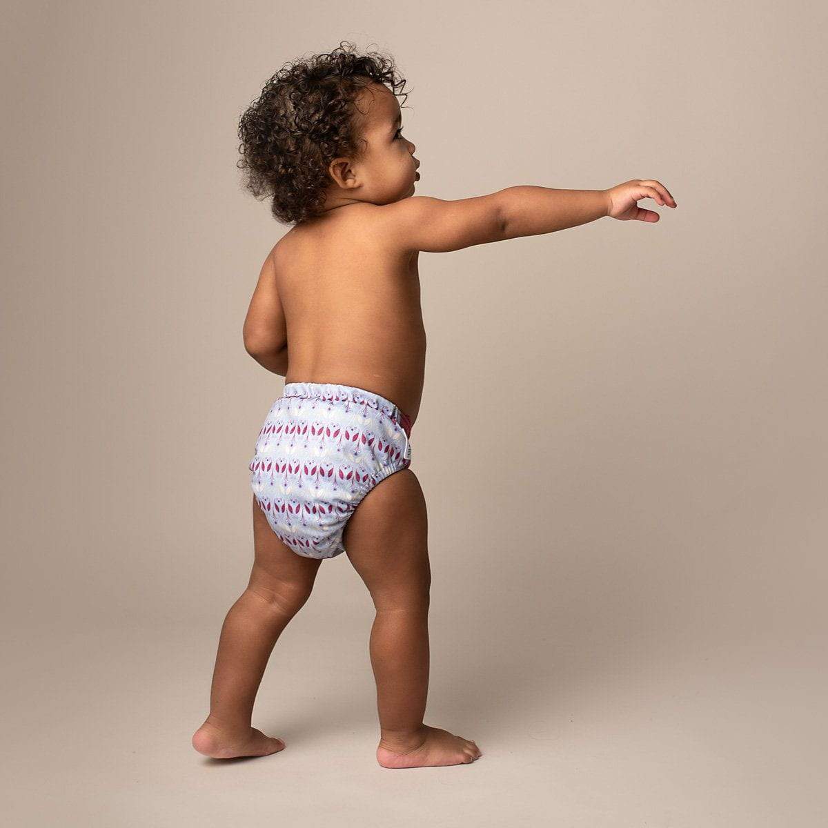 The Cloth Nappy Company Malta Grovia Hybrid Diaper Shell Green Reusable Waverly Lifestyle model shot